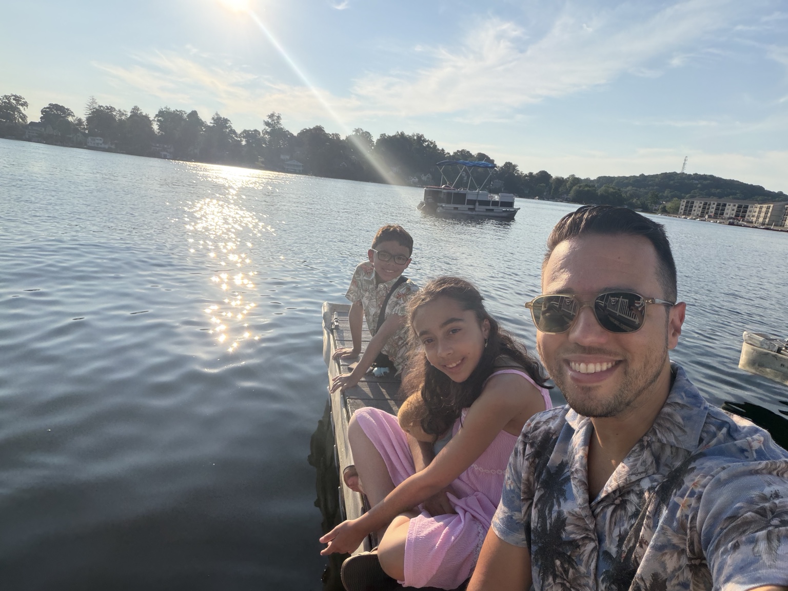 Franco with his family on the water