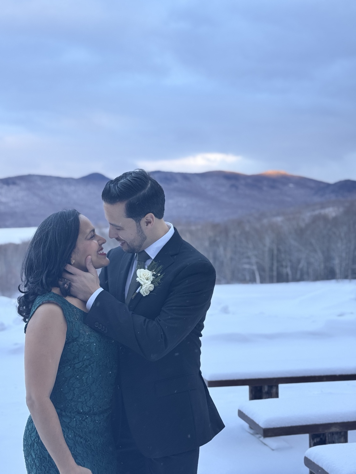 Franco and his wife outdoors in winter