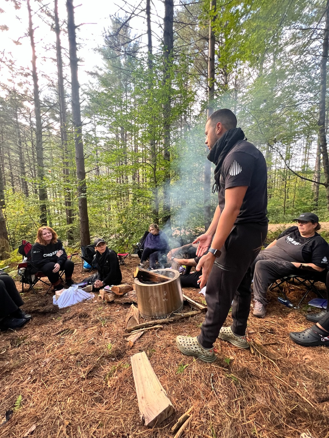 A retreat fire circle at night